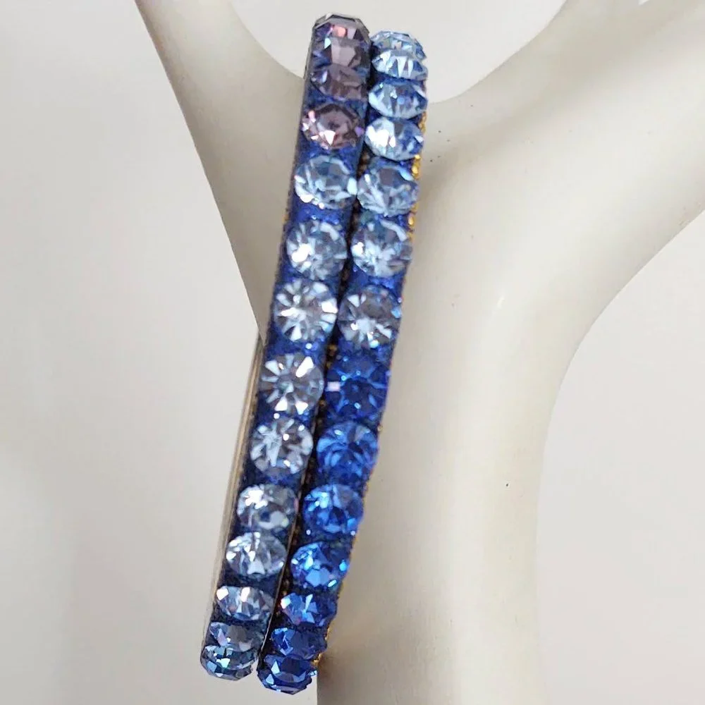 Pair of shades of blue and smoky glass beaded bangles